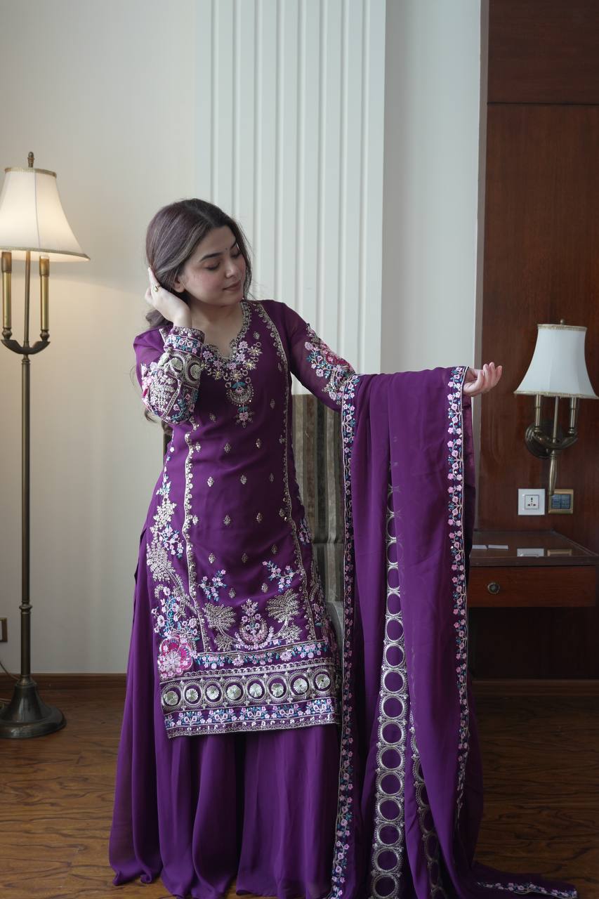 THE AMETHYST COLLECTION FOCUS ON THE RICH PURPLE HUE OF THE FAUX GEORGETTE EMBROIDERED SUIT.