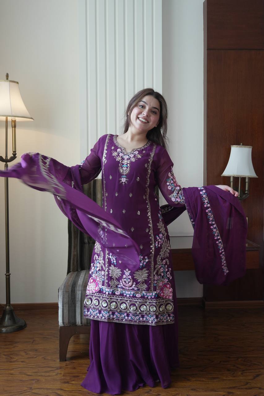 THE AMETHYST COLLECTION FOCUS ON THE RICH PURPLE HUE OF THE FAUX GEORGETTE EMBROIDERED SUIT.