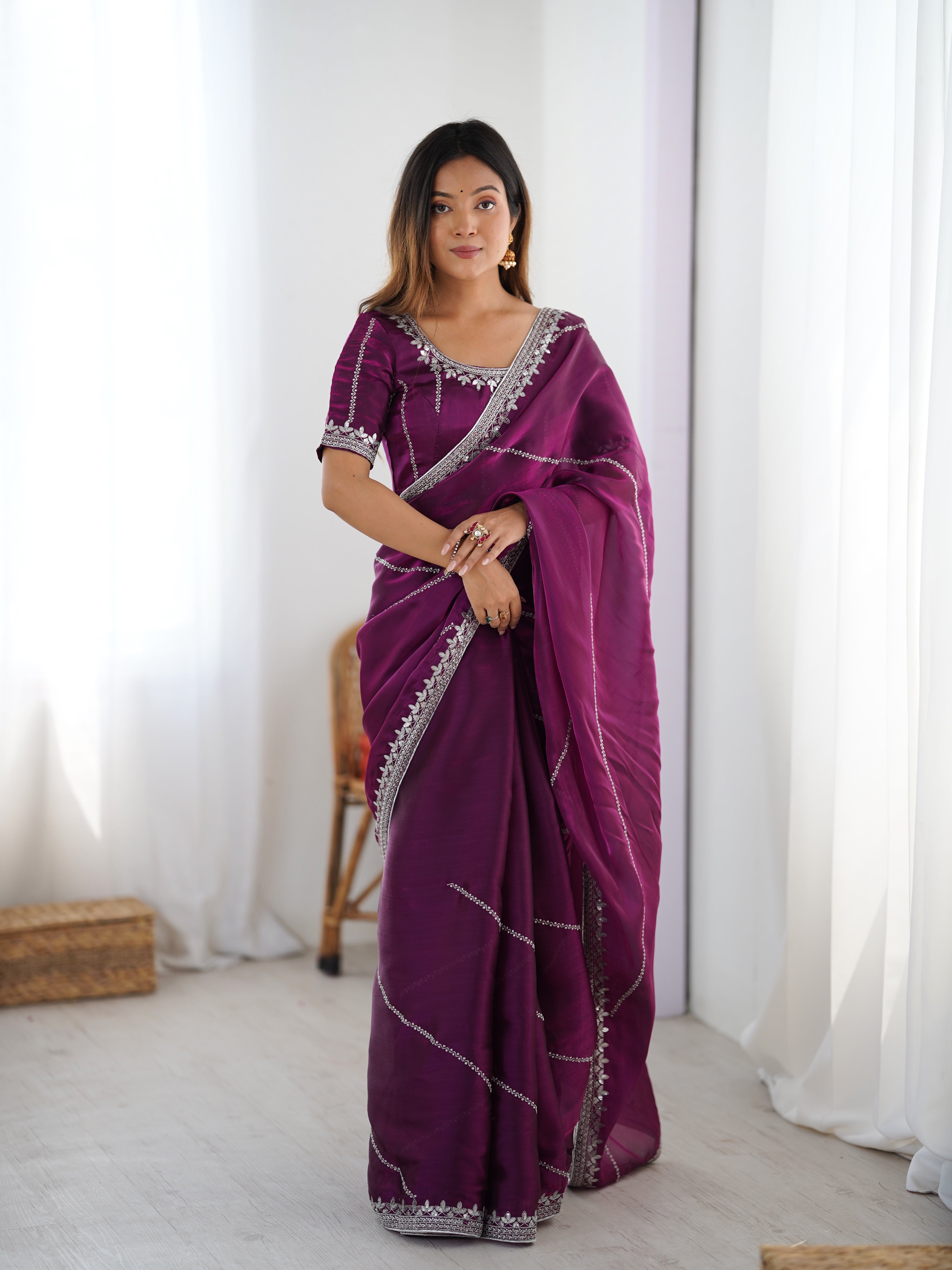 Elegant Teal Saree with Silver Embellishments