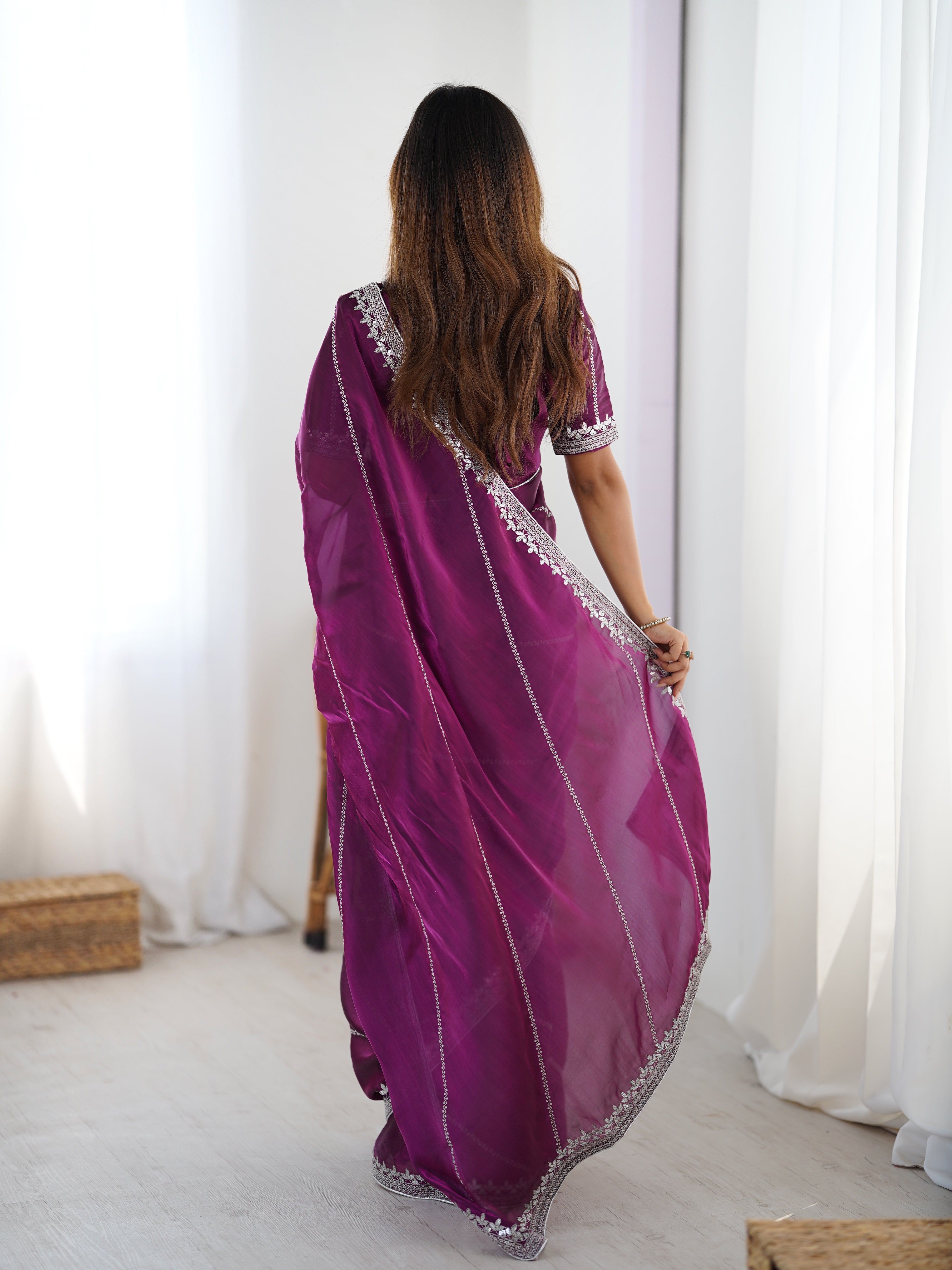 Elegant Teal Saree with Silver Embellishments