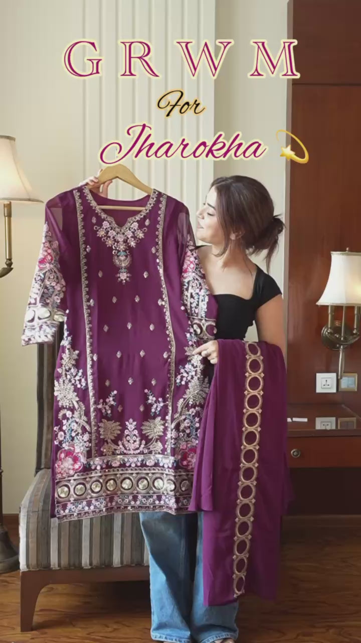 THE AMETHYST COLLECTION FOCUS ON THE RICH PURPLE HUE OF THE FAUX GEORGETTE EMBROIDERED SUIT.